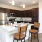 a kitchen with a table and chairs