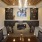 a large room with a bar and chairs