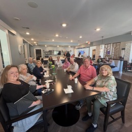people at a large table and seating
