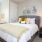 Model bedroom at The Orchards at Arlington Highlands apartments in Arlington, TX, featuring a closet and desk.