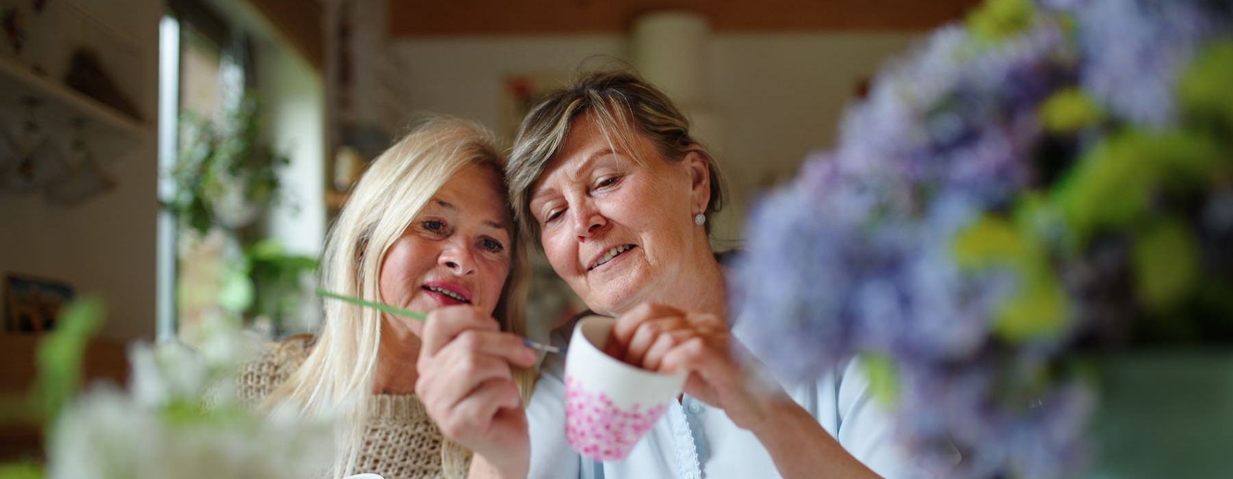 two women painting 
