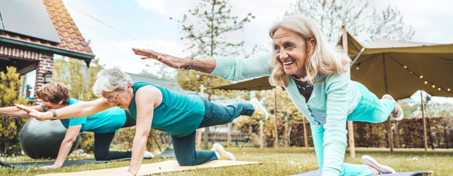 people doing yoga outdoors