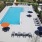 a pool with chairs around it