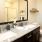Model bathroom at The Orchards at Arlington Highlands apartments in Arlington, TX, featuring a marble countertop.
