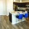 a kitchen with a dining table and chairs